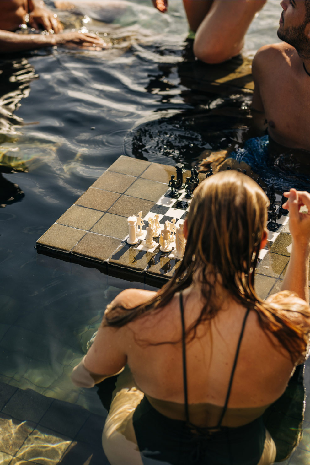ANI_Dominican_Republic_Resort_Guests_in_Pool_chess